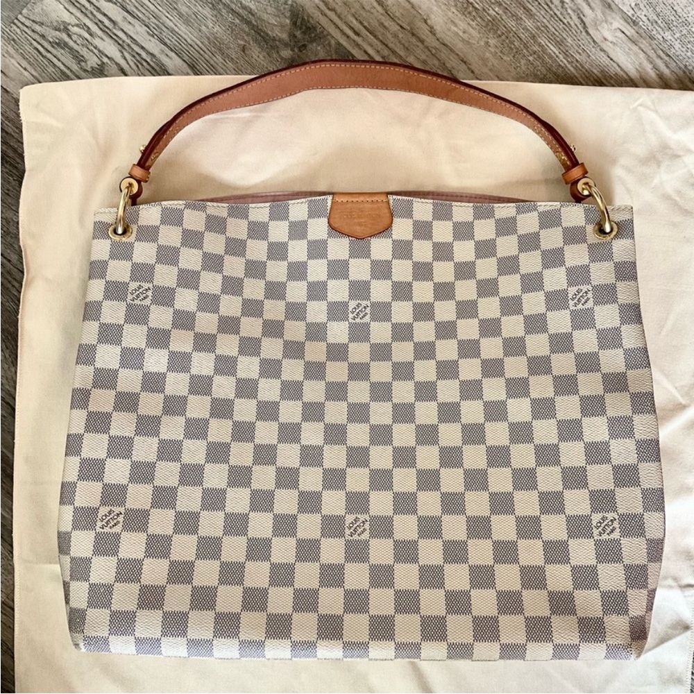 Louis Vuitton Cream Shoulder Bag with Iconic Design